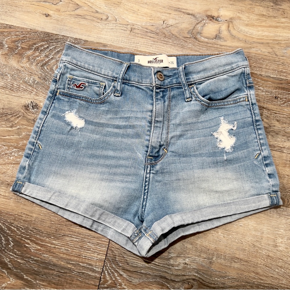 Hollister size 3 High Waisted Distressed jean shorts light wash rolled hem